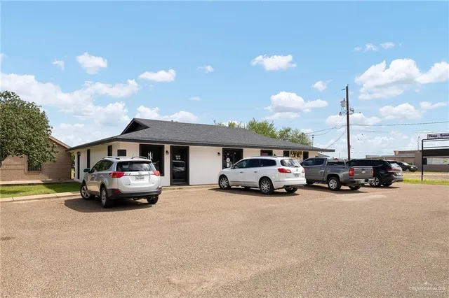 a car parked in front of a house