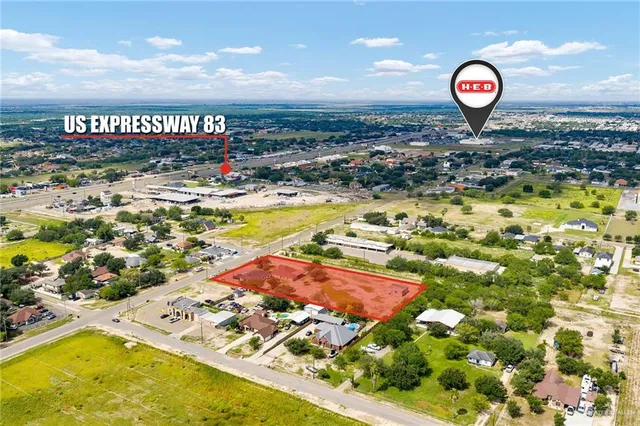 a view of a swimming pool with an outdoor space and seating area