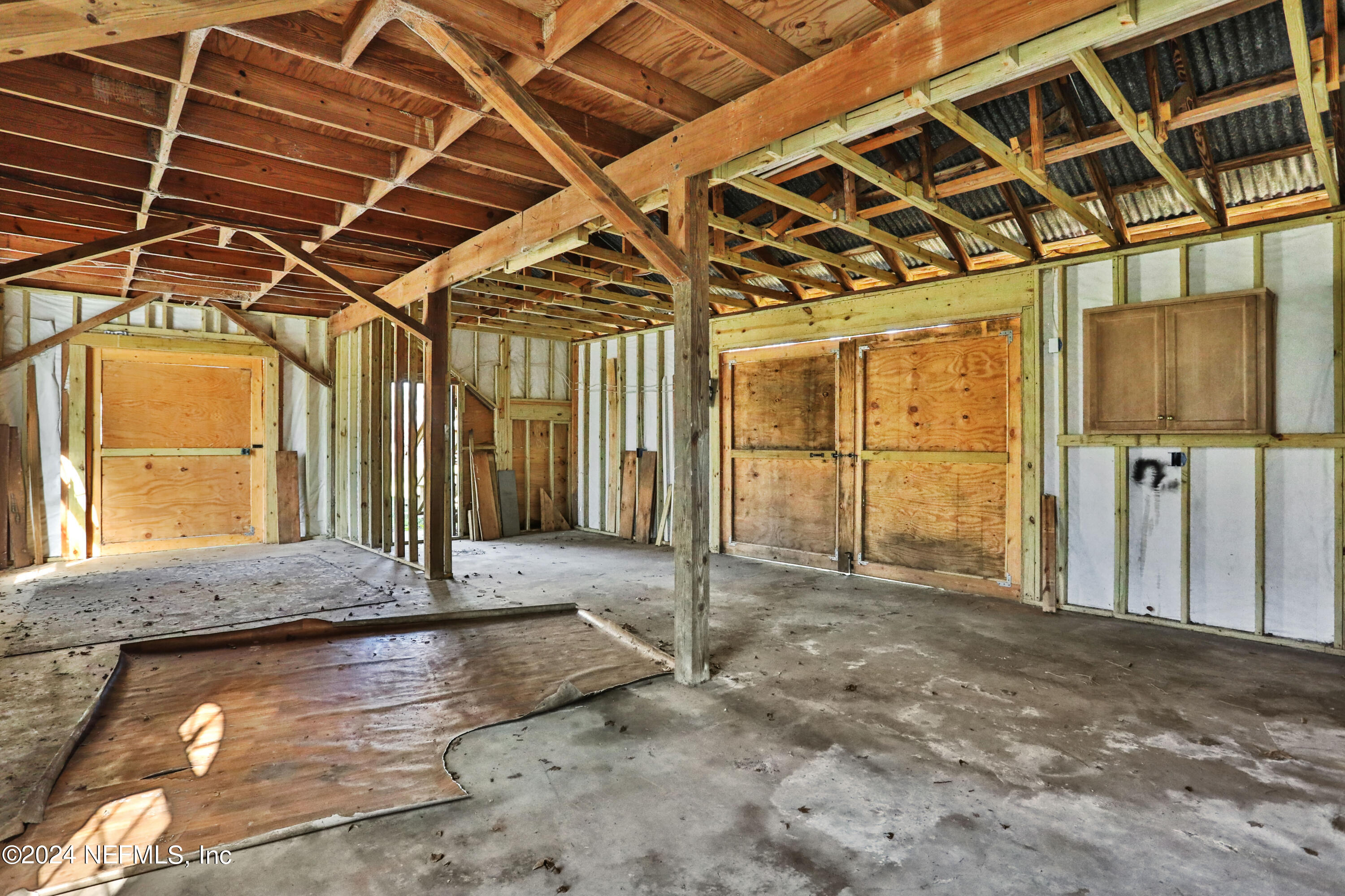 54057 Bea Road Callahan, FL 32011 - Photo 24 of 29 a view of a room with wooden walls