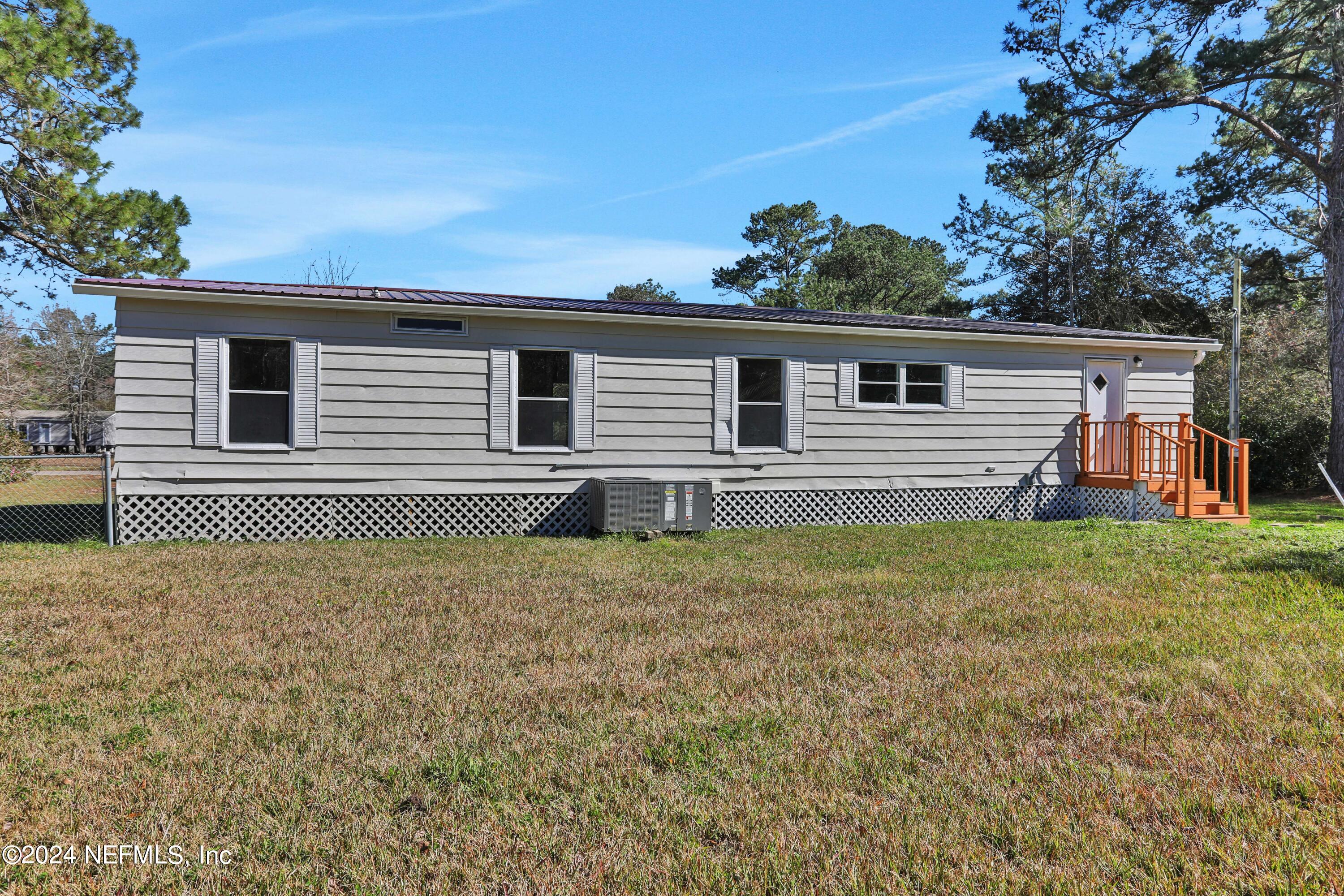 54057 Bea Road Callahan, FL 32011 - Photo 29 of 29 a view of a house with a yard