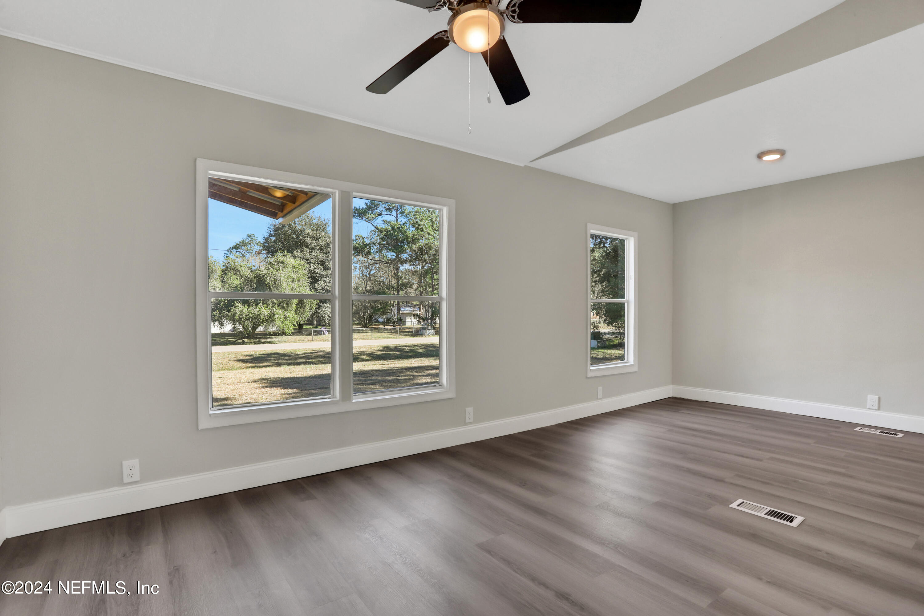 54057 Bea Road Callahan, FL 32011 - Photo 10 of 29 a view of room window and wooden floor