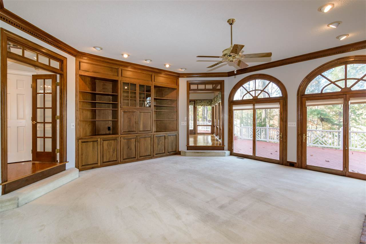 2808 Combe Hill Trail Raleigh, NC 27613 - Photo 10 of 30 Did we mention the view? Watch the outdoor activity on the golf course from the comfort of your couch if you would like Den/Family/Great Room