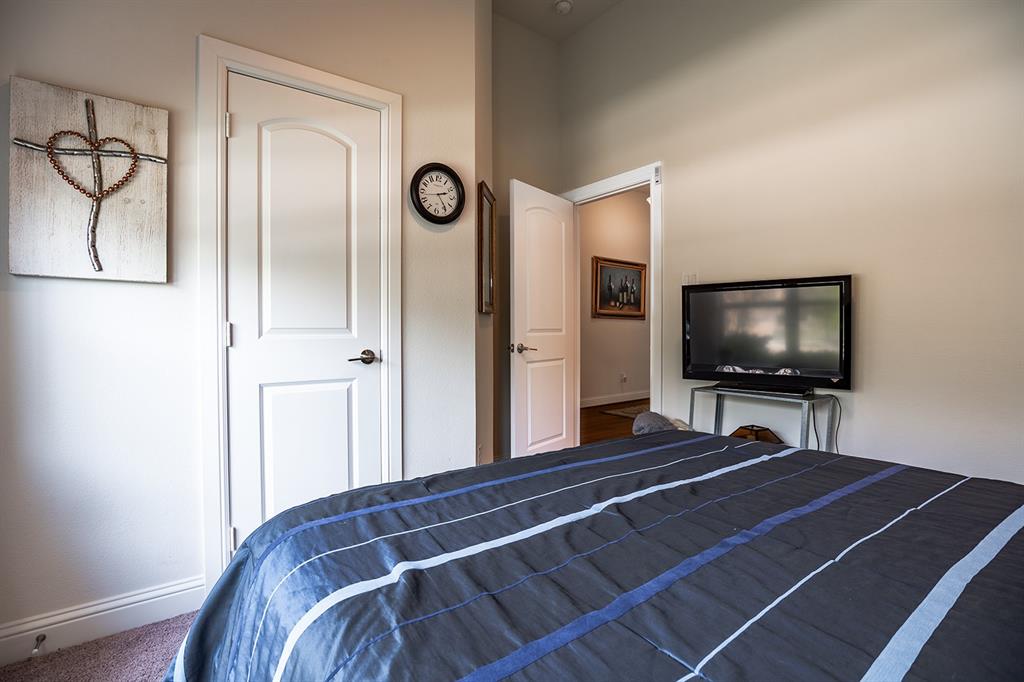 1213 Sea Island Road Aubrey, TX 76227 - Photo 11 of 36 Bright and inviting second guest room, perfect for family or friends