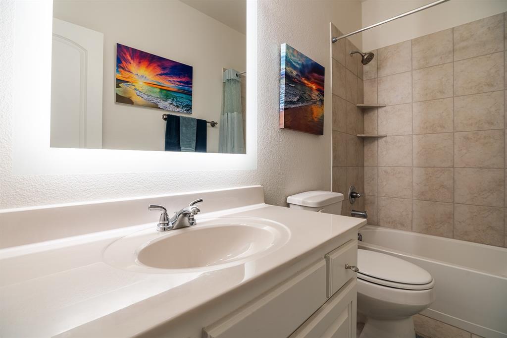 1213 Sea Island Road Aubrey, TX 76227 - Photo 12 of 36 Guest bathroom