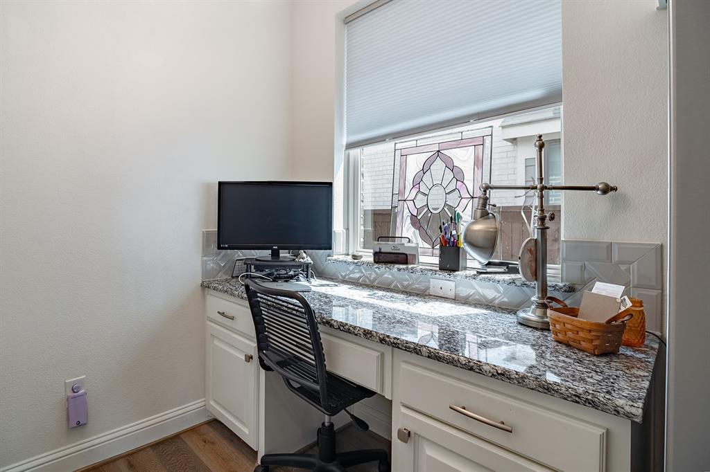 1213 Sea Island Road Aubrey, TX 76227 - Photo 18 of 36 Convenient built-in office tucked around the corner from the kitchen—perfect for working from home or managing household tasks