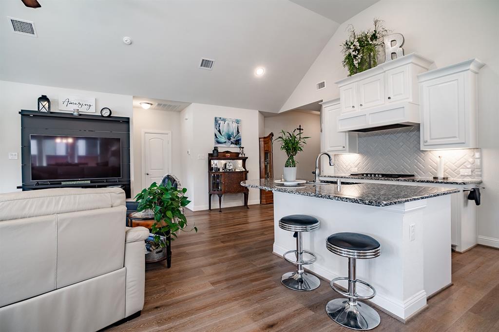 1213 Sea Island Road Aubrey, TX 76227 - Photo 20 of 36 Stainless steel appliances and decorative faucet.