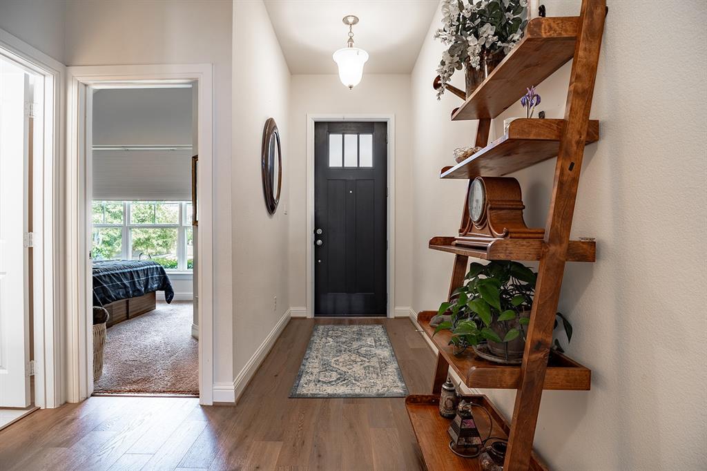 1213 Sea Island Road Aubrey, TX 76227 - Photo 6 of 36 Bright and welcoming entryway with elegant front door and open, airy feel.