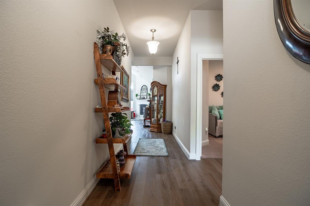 1213 Sea Island Road Aubrey, TX 76227 - Photo 8 of 36 Another view from the entry to the living area and bypassing the guest rooms