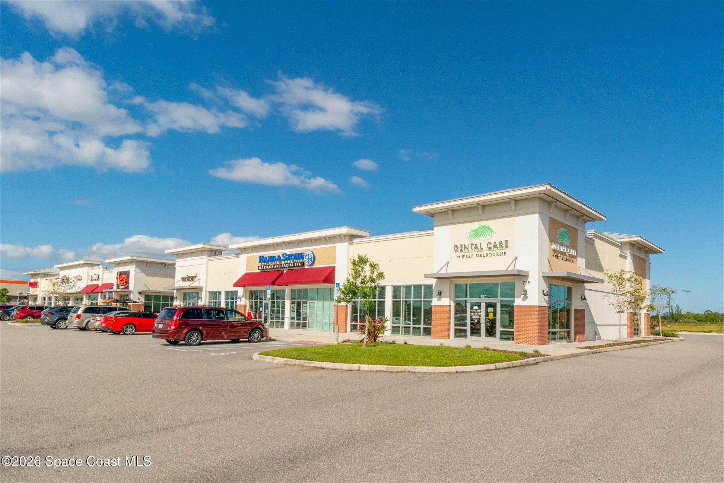413 Orlov Road Northwest Palm Bay, FL 32907 - Photo 62 of 63 a view of a building with street