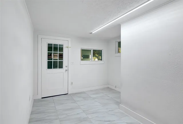 an empty room with windows