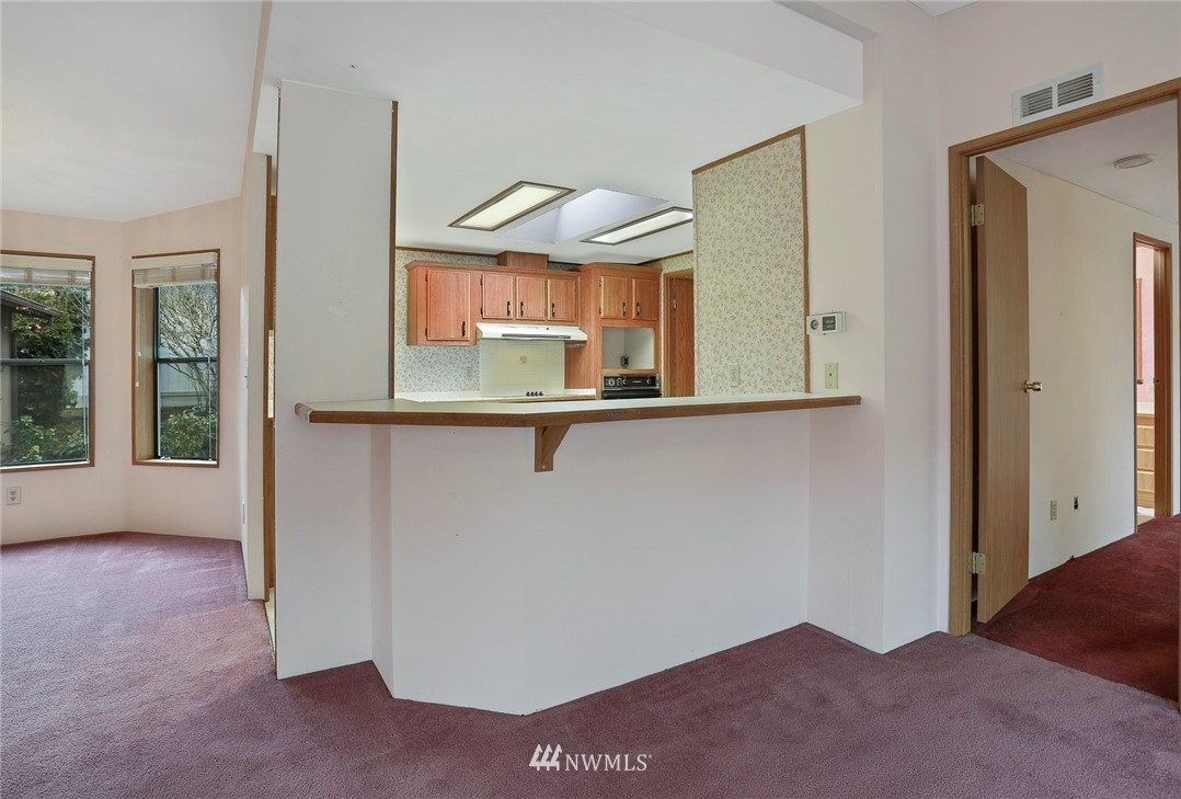 24031 10th Place West Bothell, WA 98021 - Photo 12 of 32 a view of a room that has a sink and a mirror