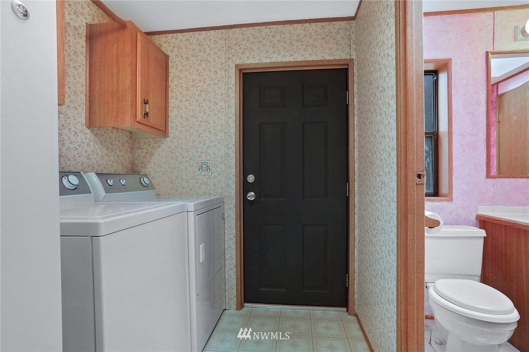 24031 10th Place West Bothell, WA 98021 - Photo 23 of 32 a bathroom with a toilet and a sink