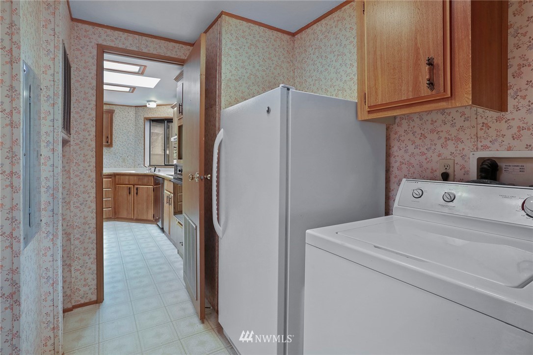 24031 10th Place West Bothell, WA 98021 - Photo 24 of 32 a view of hallway with washer and dryer