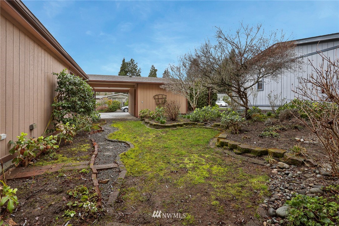 24031 10th Place West Bothell, WA 98021 - Photo 28 of 32 a view of a house with a yard
