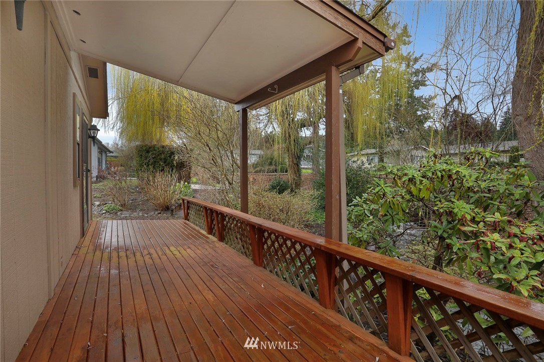 24031 10th Place West Bothell, WA 98021 - Photo 29 of 32 a view of balcony with wooden floor