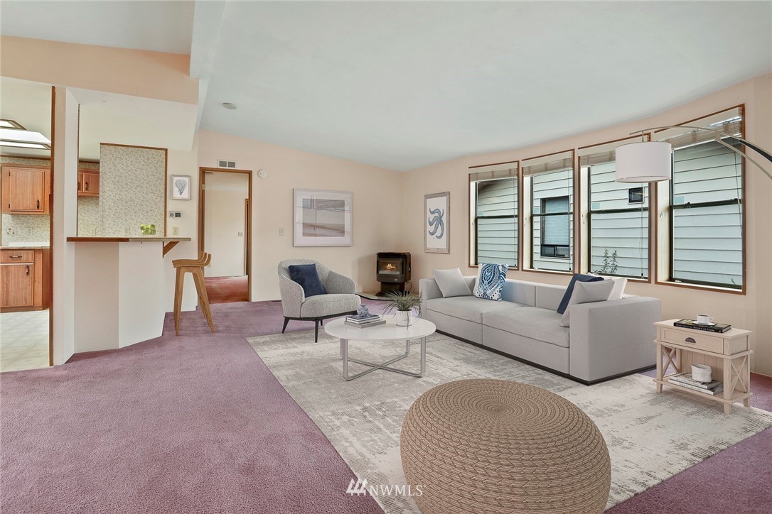 24031 10th Place West Bothell, WA 98021 - Photo 3 of 32 a living room with furniture and a large window