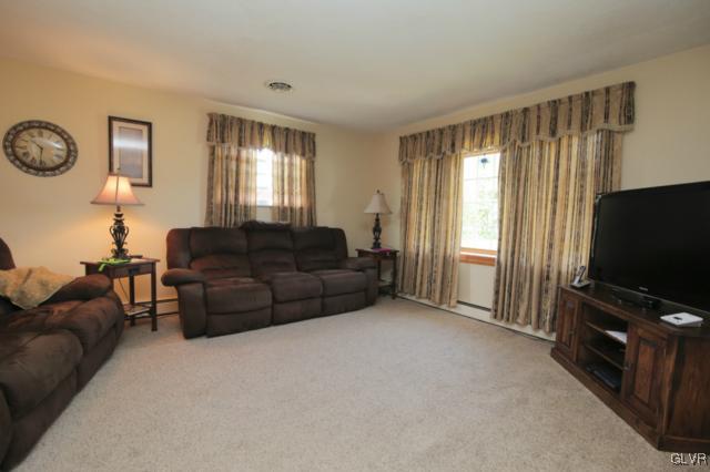 1280 Seifert Road Nazareth, PA 18064 - Photo 15 of 49 a living room with furniture and a flat screen tv