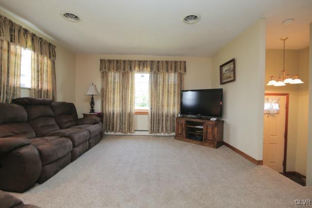 1280 Seifert Road Nazareth, PA 18064 - Photo 16 of 49 a living room with furniture and a flat screen tv