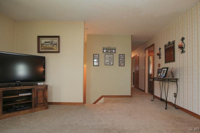 1280 Seifert Road Nazareth, PA 18064 - Photo 17 of 49 a living room with furniture and a flat screen tv