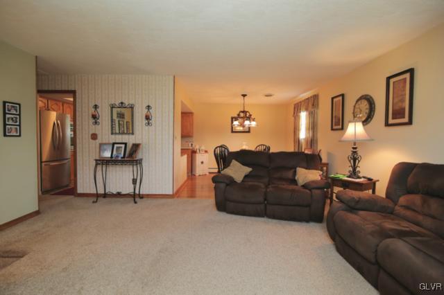 1280 Seifert Road Nazareth, PA 18064 - Photo 18 of 49 a living room with furniture and a flat screen tv