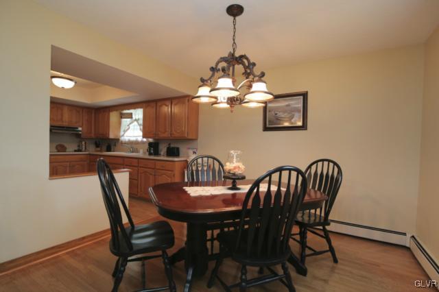 1280 Seifert Road Nazareth, PA 18064 - Photo 23 of 49 a view of a dining room with furniture wooden floor and chandelier