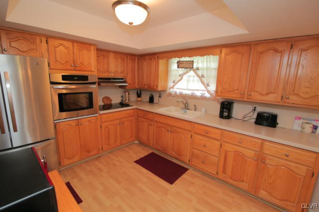 1280 Seifert Road Nazareth, PA 18064 - Photo 26 of 49 a kitchen with stainless steel appliances a refrigerator sink and cabinets