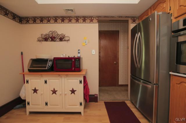 1280 Seifert Road Nazareth, PA 18064 - Photo 30 of 49 a view of kitchen with stainless steel appliances granite countertop a refrigerator and a stove