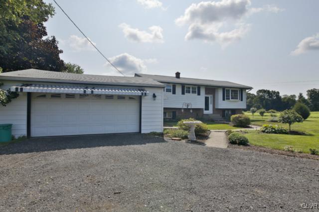 1280 Seifert Road Nazareth, PA 18064 - Photo 3 of 49 a front view of a house with a yard