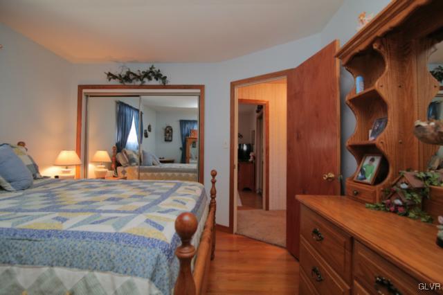 1280 Seifert Road Nazareth, PA 18064 - Photo 36 of 49 a bedroom with a bed and a mirror on dresser