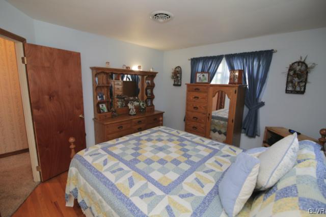 1280 Seifert Road Nazareth, PA 18064 - Photo 38 of 49 a bedroom with a bed and a dresser