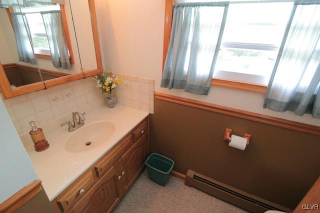 1280 Seifert Road Nazareth, PA 18064 - Photo 40 of 49 a bathroom with a bathtub and a window