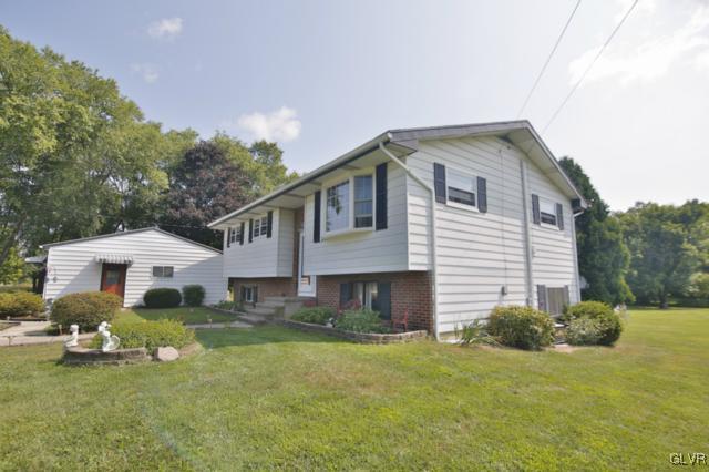 1280 Seifert Road Nazareth, PA 18064 - Photo 4 of 49 a front view of a house with a yard