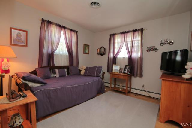 1280 Seifert Road Nazareth, PA 18064 - Photo 43 of 49 a bedroom with a bed and large windows
