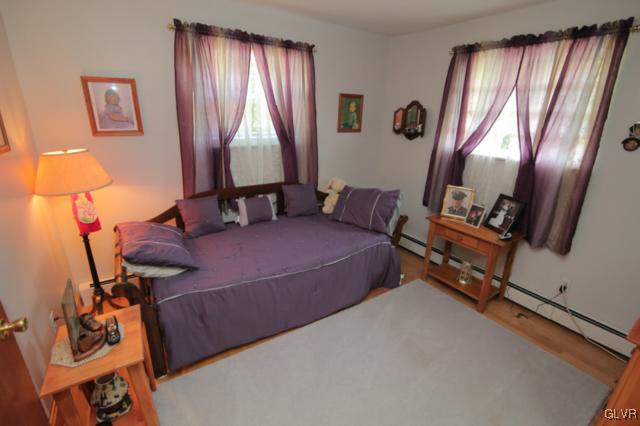 1280 Seifert Road Nazareth, PA 18064 - Photo 45 of 49 a bedroom with a bed and wooden floor
