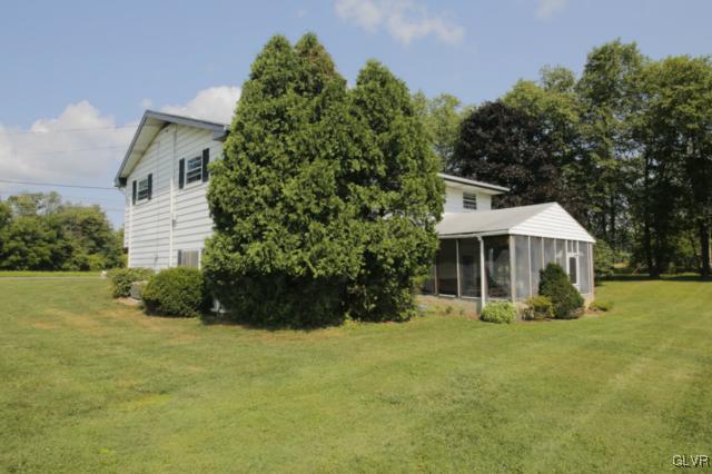 1280 Seifert Road Nazareth, PA 18064 - Photo 7 of 49 a front view of a house with a yard