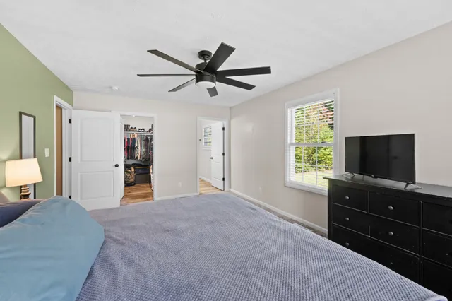 a view of storage and utility room with washer and dryer