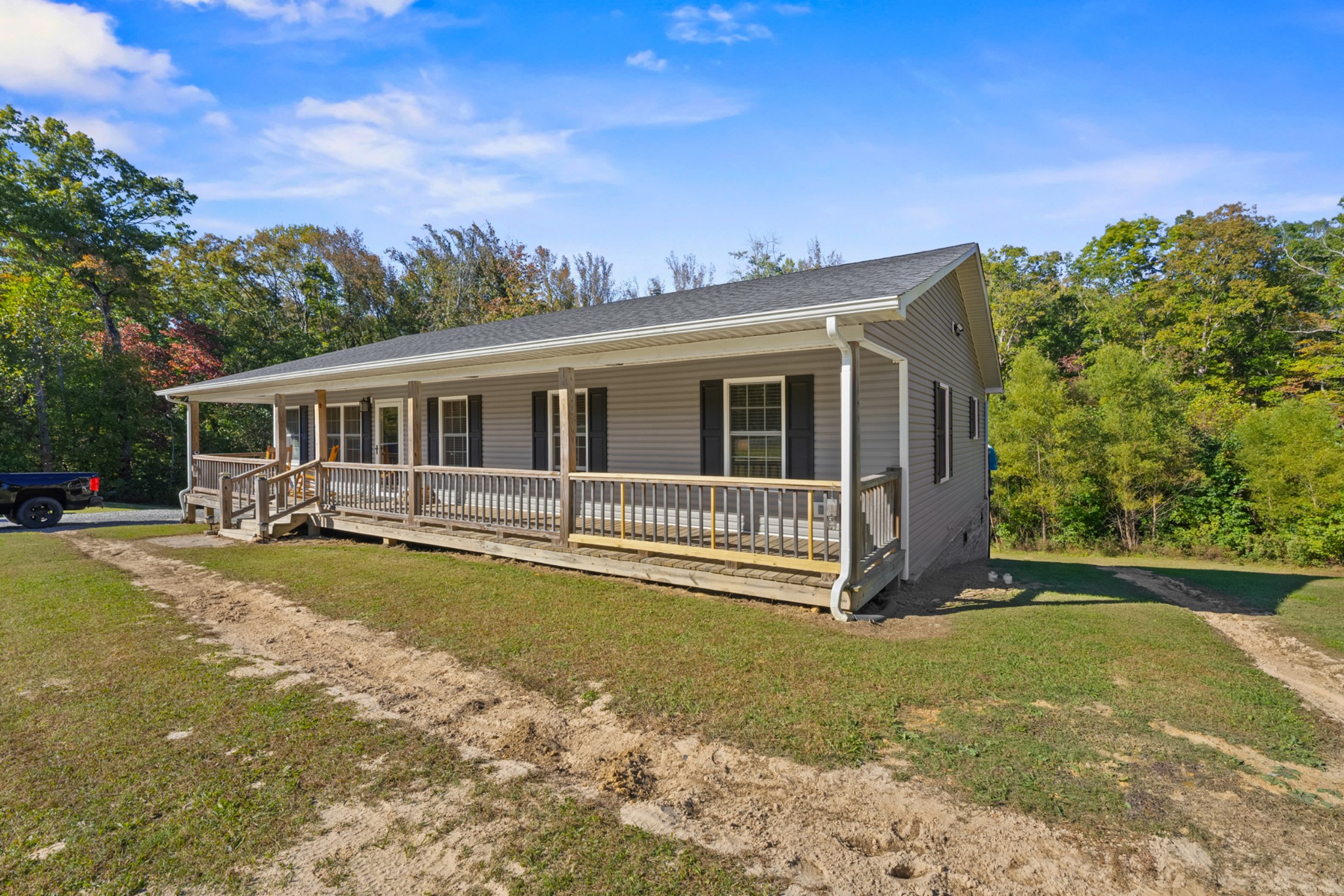 936 Adams Road Tracy City, TN 37387 - Photo 2 of 28 a front view of a house with a yard