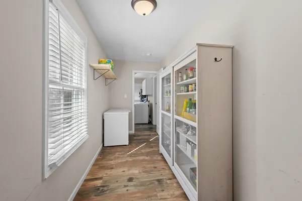 a view of hallway with washer and dryer