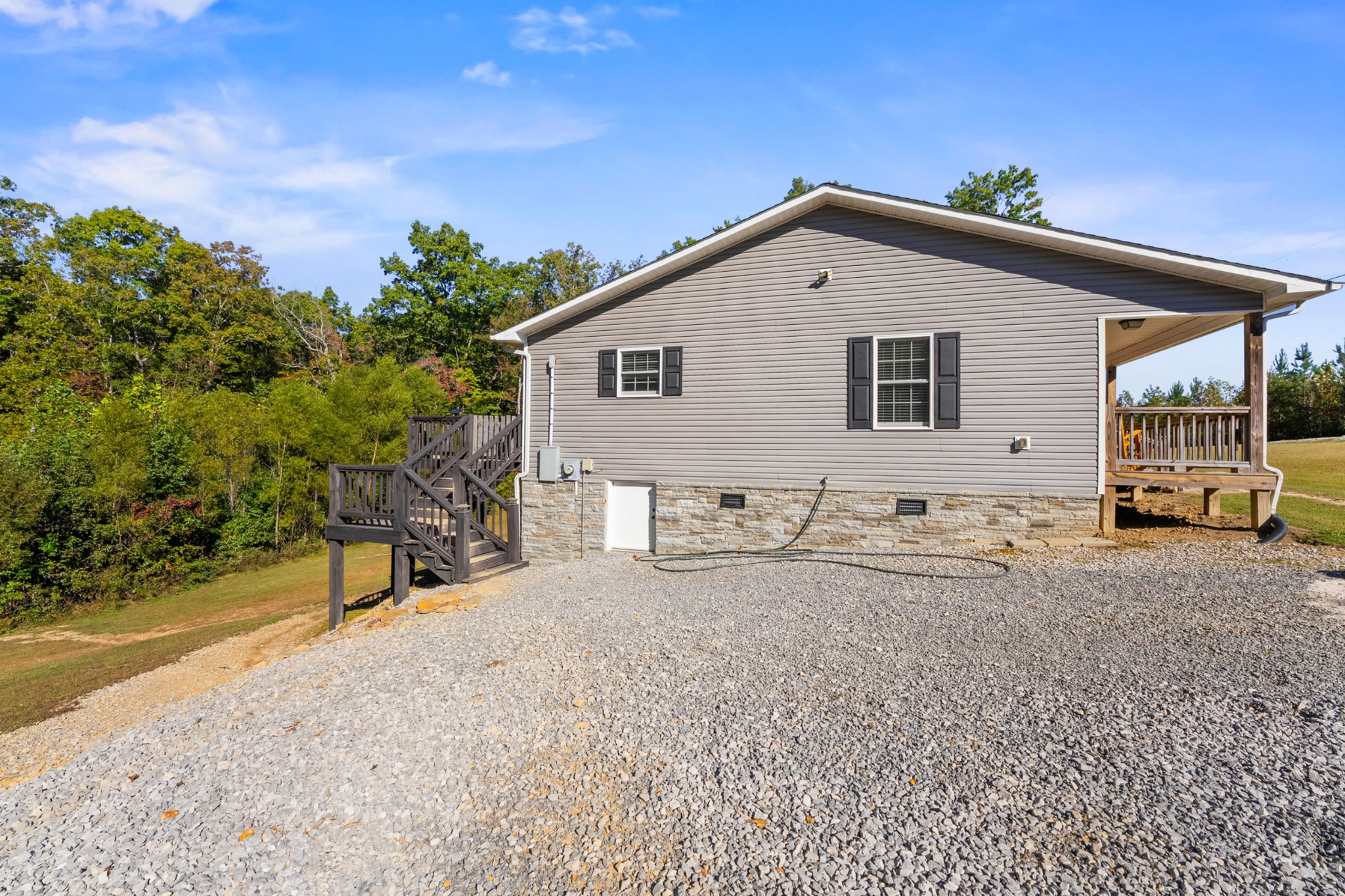 936 Adams Road Tracy City, TN 37387 - Photo 25 of 28 a house view with a outdoor space