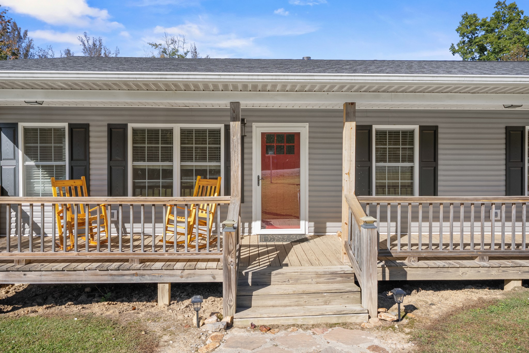 936 Adams Road Tracy City, TN 37387 - Photo 3 of 28 a front view of a house with a balcony
