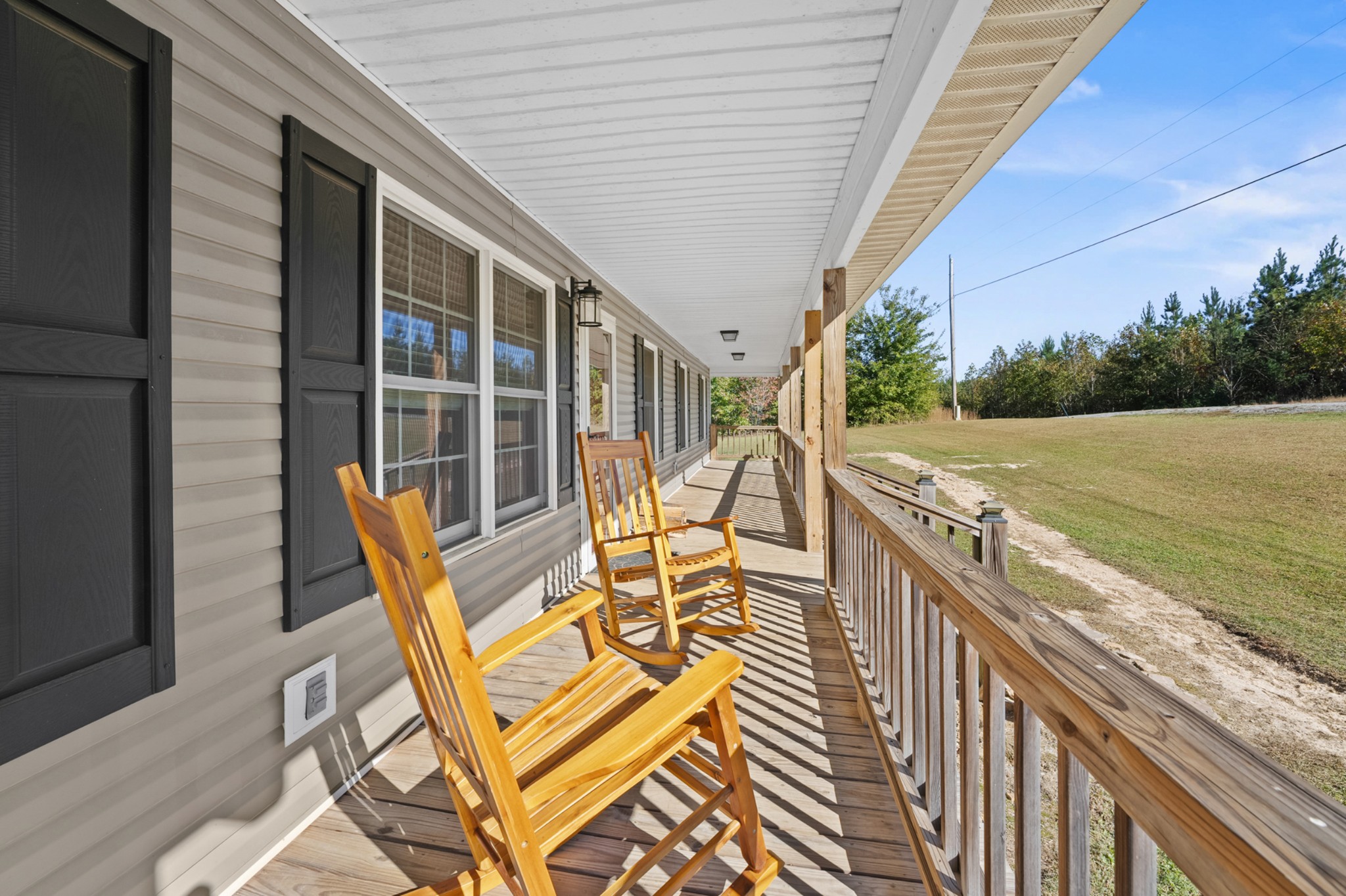 936 Adams Road Tracy City, TN 37387 - Photo 4 of 28 a view of a patio with wooden floor
