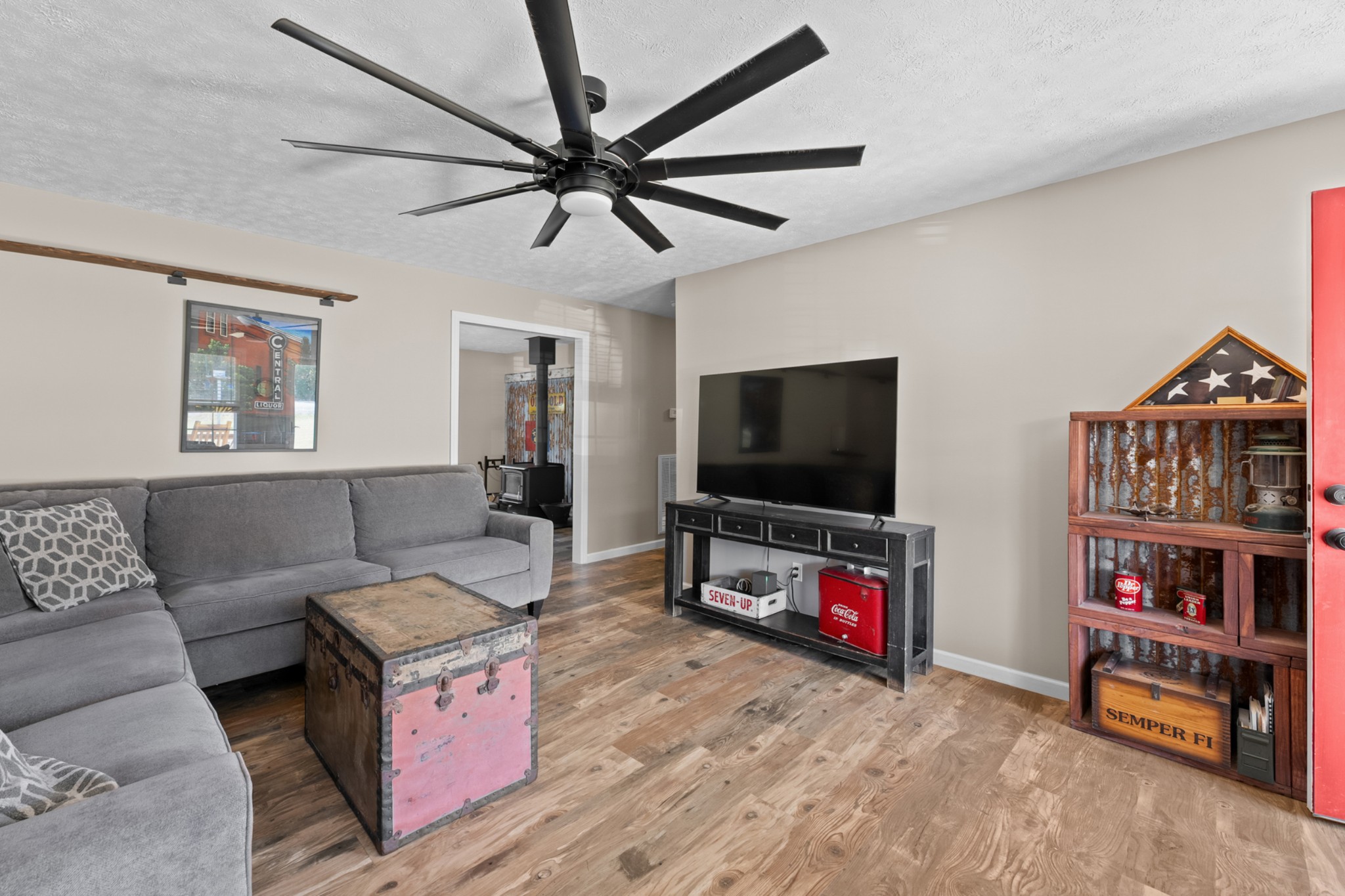 936 Adams Road Tracy City, TN 37387 - Photo 6 of 28 a living room with furniture and a flat screen tv