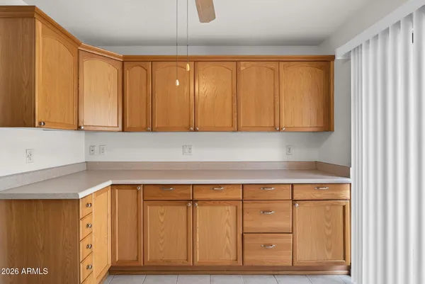 a kitchen with a refrigerator sink and microwave