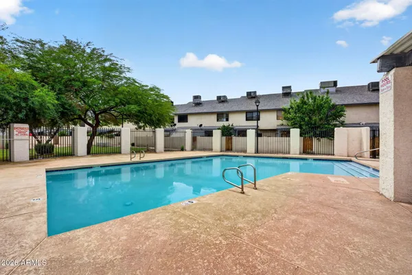 a view of a back yard of the building