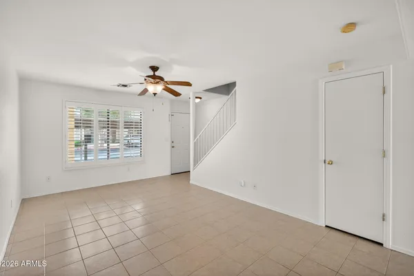 a picture of a bench in front of a wall