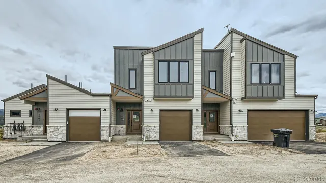 a front view of a house with yard