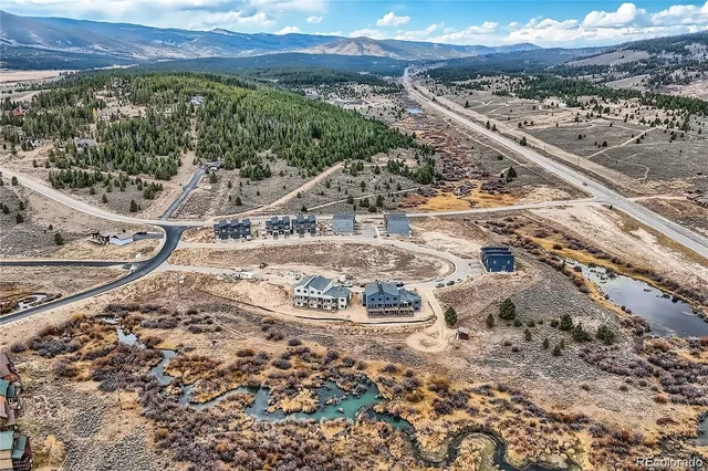 a view of a city with ocean view