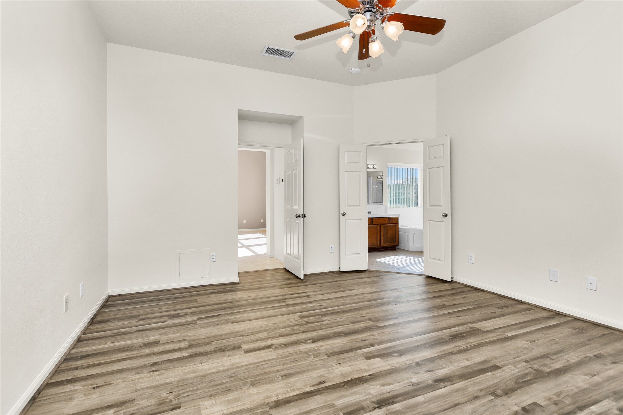 5201 Penny Road Cleveland, TX 77328 - Photo 20 of 27 wooden floor in an empty room