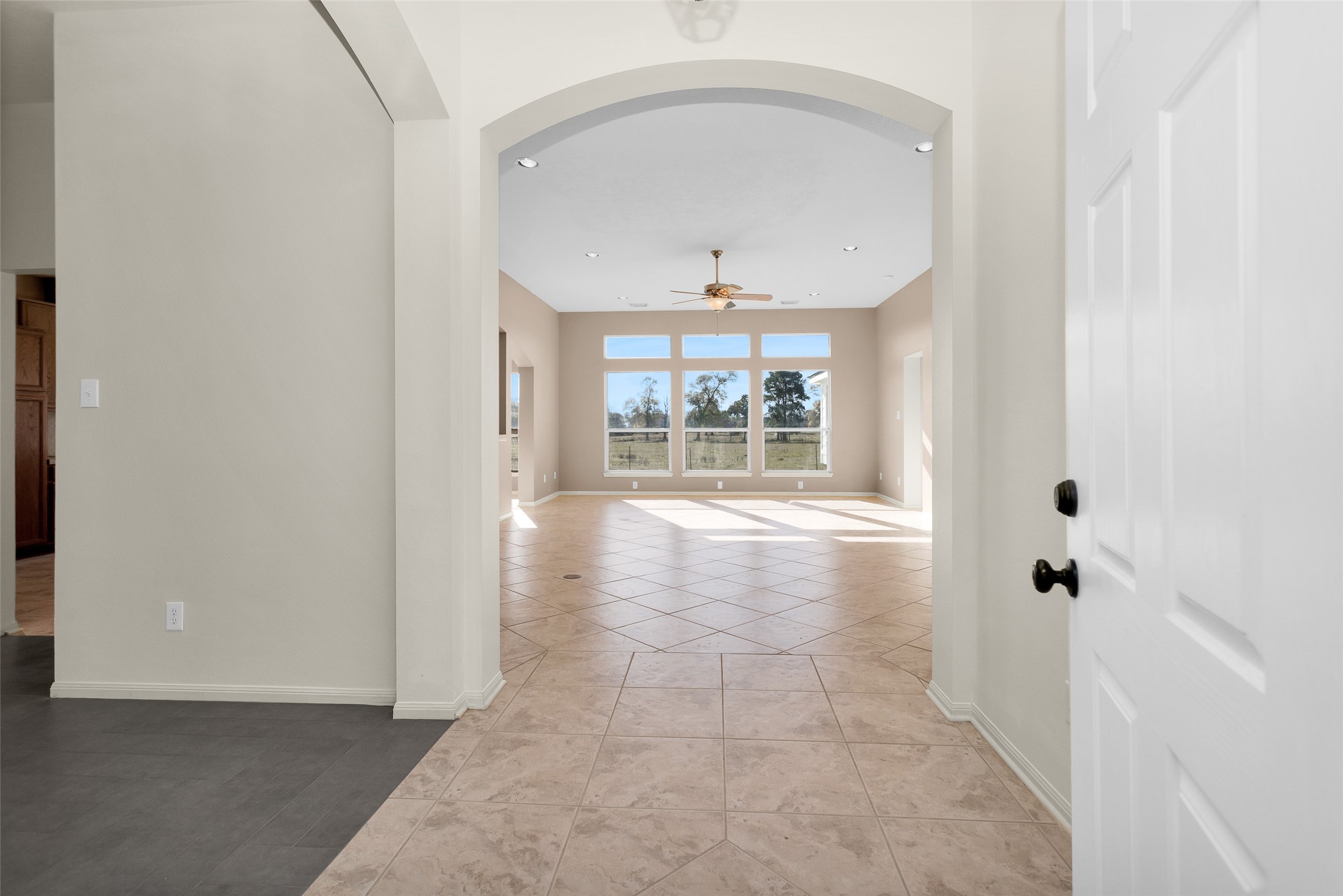 5201 Penny Road Cleveland, TX 77328 - Photo 6 of 27 an empty room with windows
