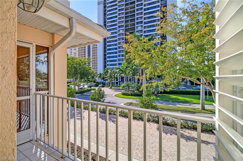 5635 Turtle Bay Drive, Unit I10 Naples, FL 34108 - Photo 7 of 25 a view of a porch with a yard